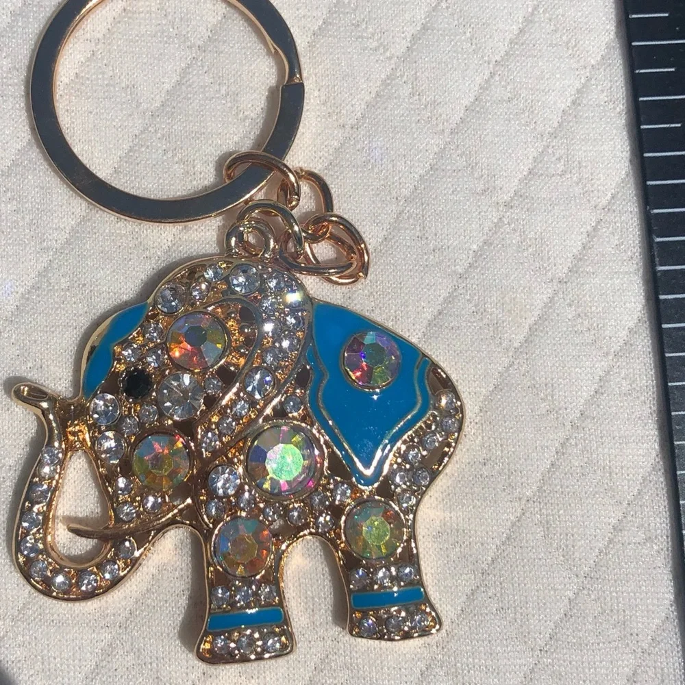 Beautiful lightweight sparkly elephant keychain 💙🐘🤍 - Picture 5 of 7